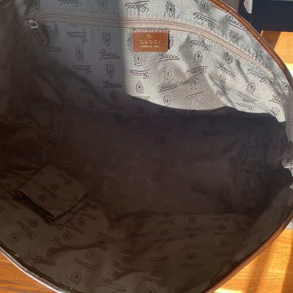 Authentic Gucci brown monogram canvas tote!With three charms.Near perfect! - Picture 2 of 14